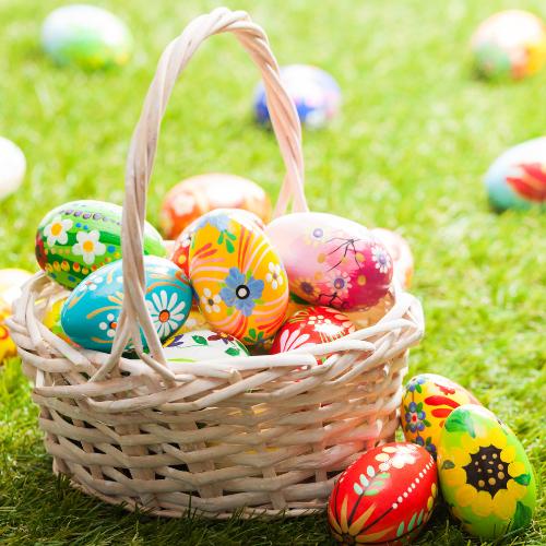 ibrant Easter eggs artfully arranged as part of a home's Easter decor, showcasing a variety of patterns and colors for festive spring ambiance.