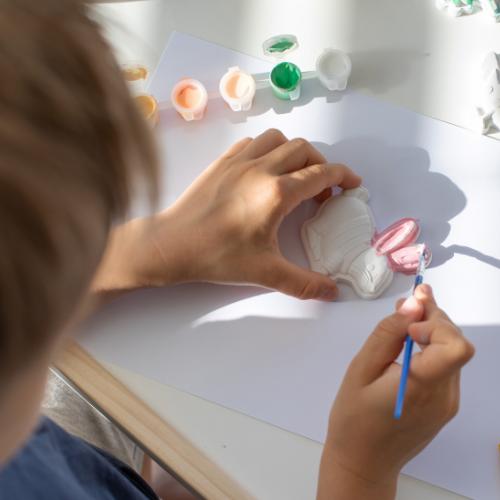 A charming Easter decor setup featuring a cute Easter bunny figurine